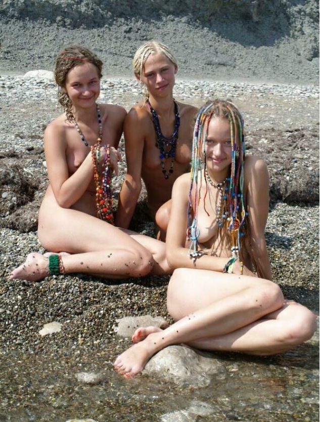 Bare girls students on a beach